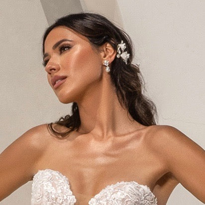 Model wearing the Gemma Pearl Dangle Earrings