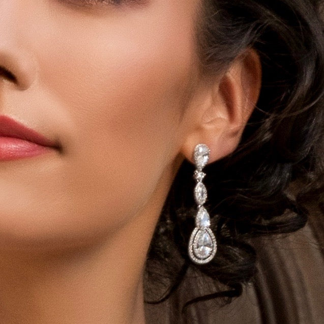 Airelle Earring on a Model showing only one side of her face.