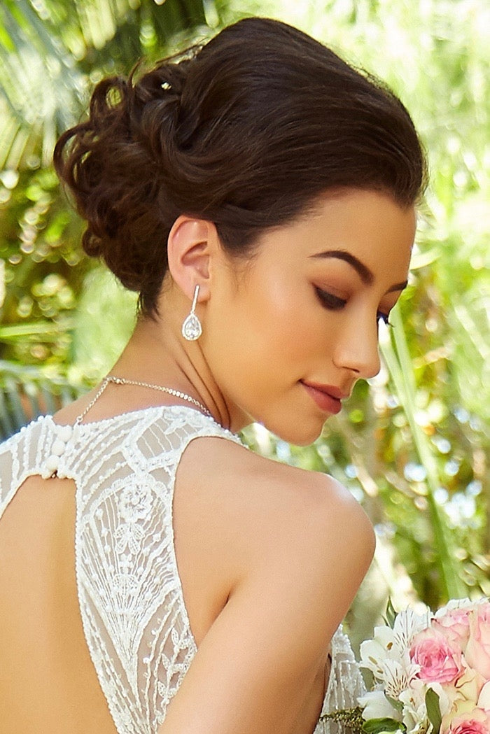 Alberta Earrings Pear Shaped Linear Dangle Earring worn by a Bride