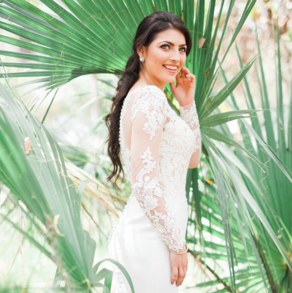 Beatriz Pearl and Crystal Stud Statement Earrings from Anna Bellagio wearing a KKC bridal gown.