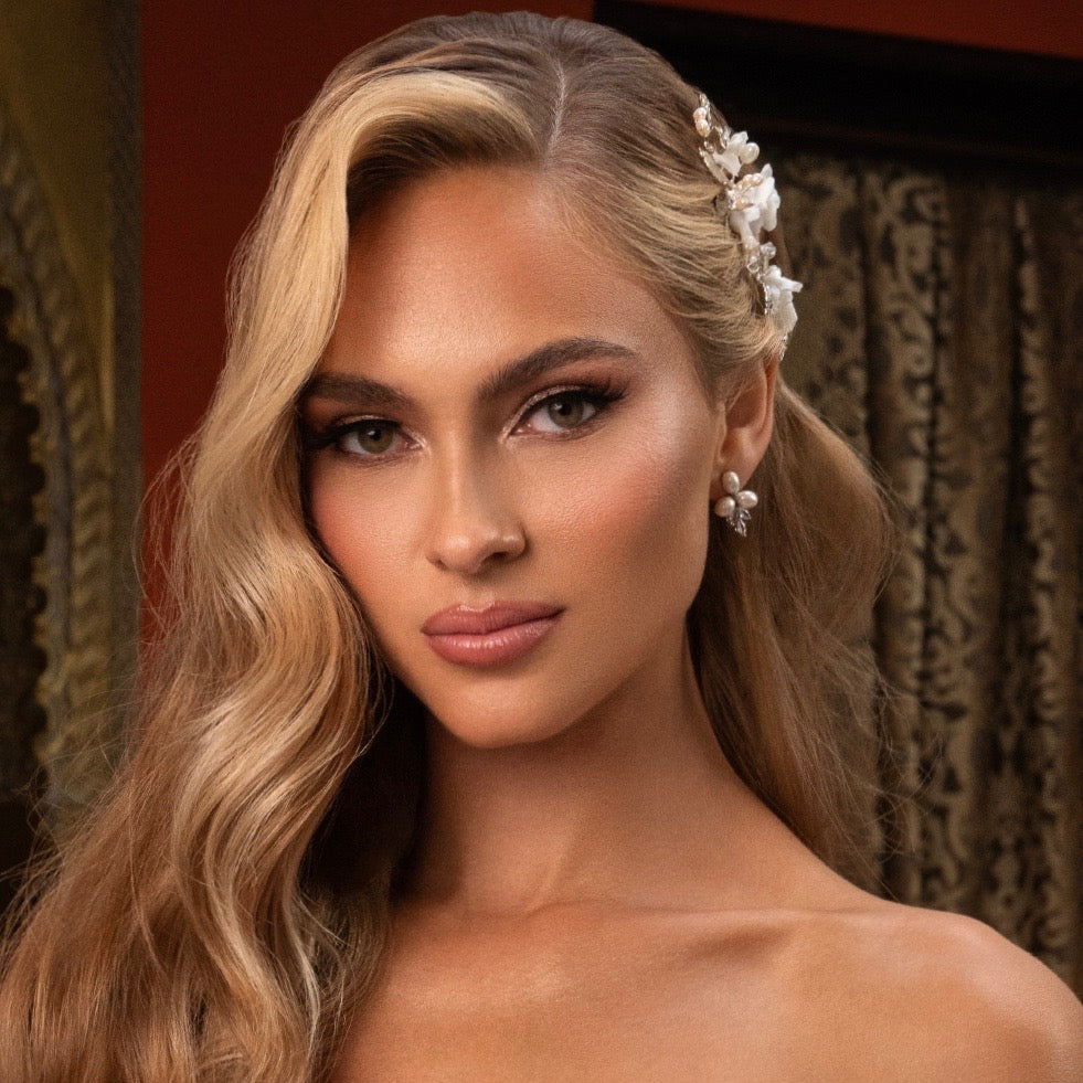 Eleanora Pearl Cluster Earrings from Anna Bellagio . Model wearing them with her hair pulled back on one side