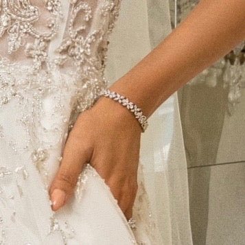 Serafina Floral Bridal Bracelet on Model with a Kitty Chen Bridal Gown