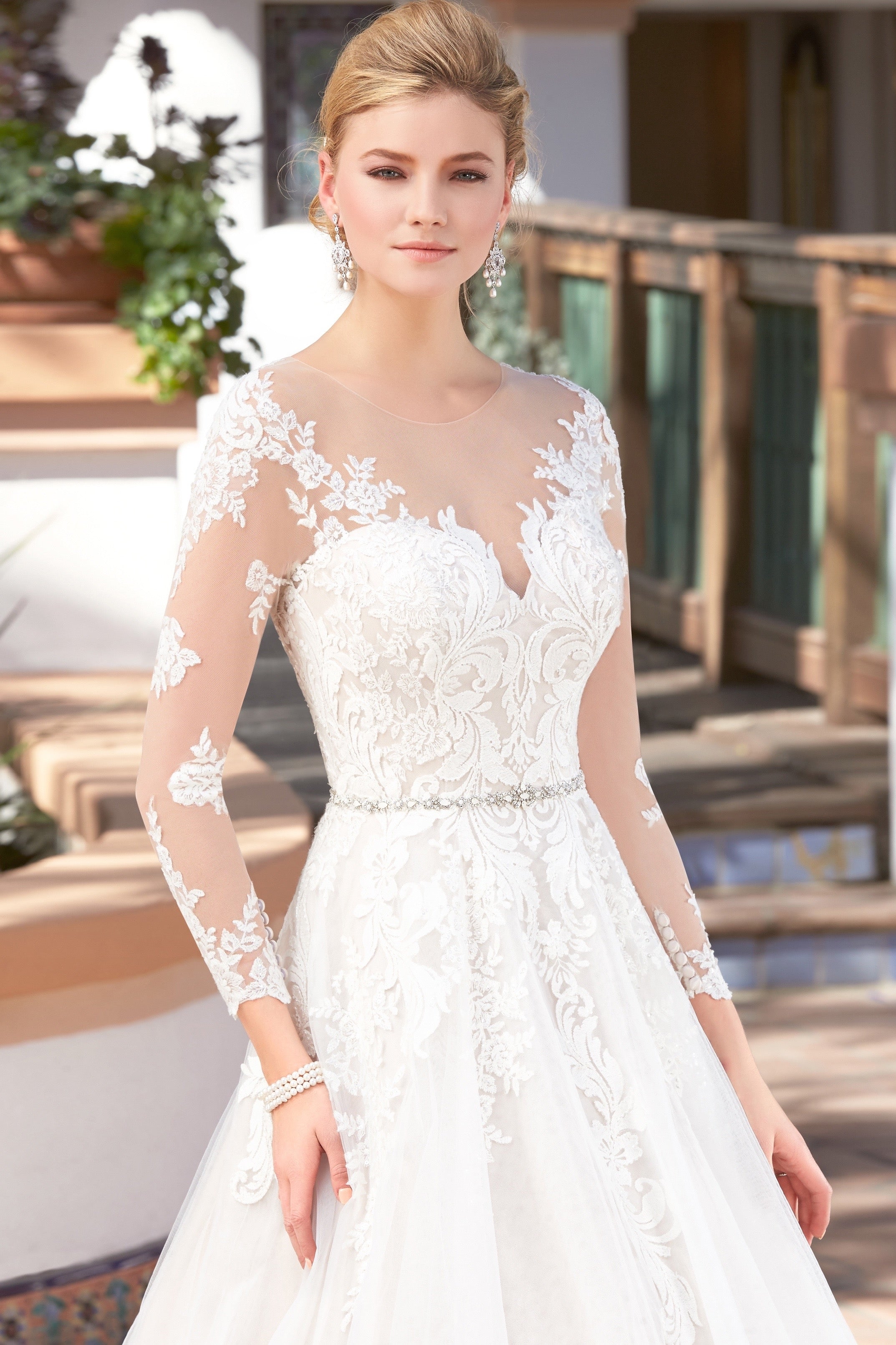 Eliana Freshwater Pearl Chandelier Earrings on a Model Bride wearing a Kitty Chen Bridal Gown. 